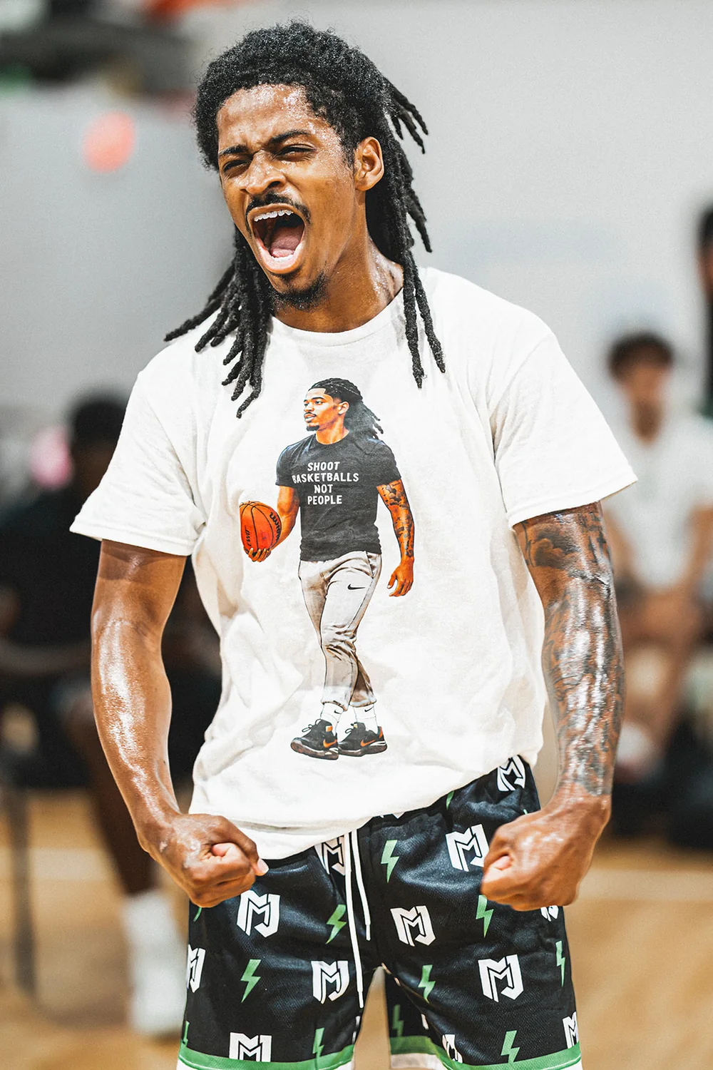 MJM Hoops athlete celebrating at a live event