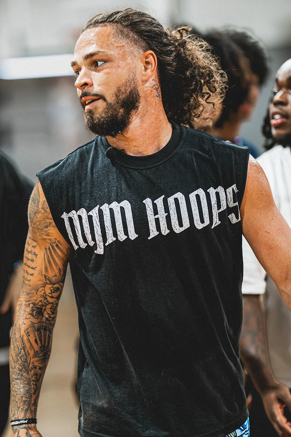 MJM Hoops athlete wearing branded apparel at a live event